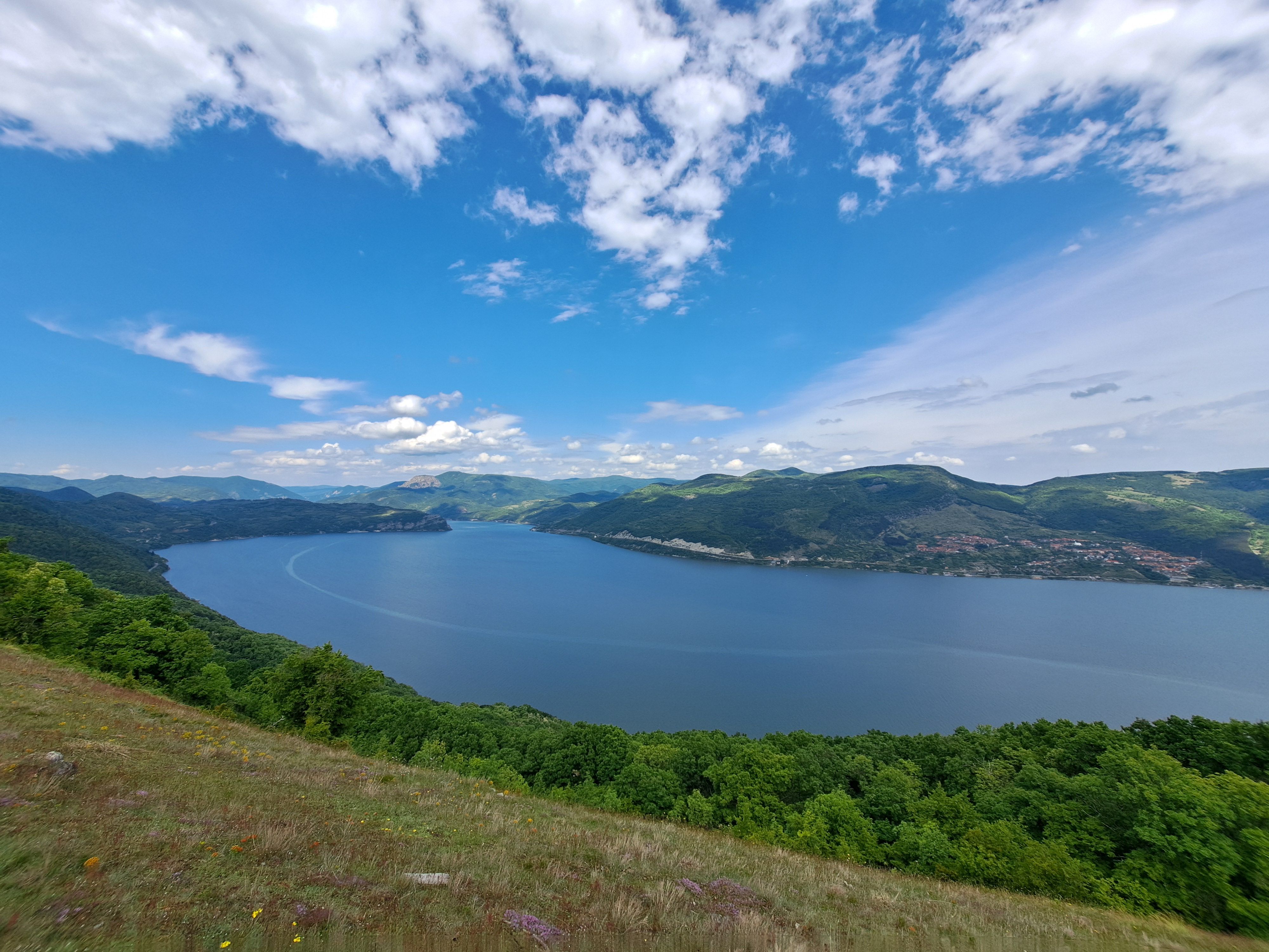 Panoramic view of the Danube River winding through the Iron Gates Gorge between Serbia and Romania