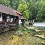 Traditional mill house by the Blautopf Spring near the Danube's source region in Germany