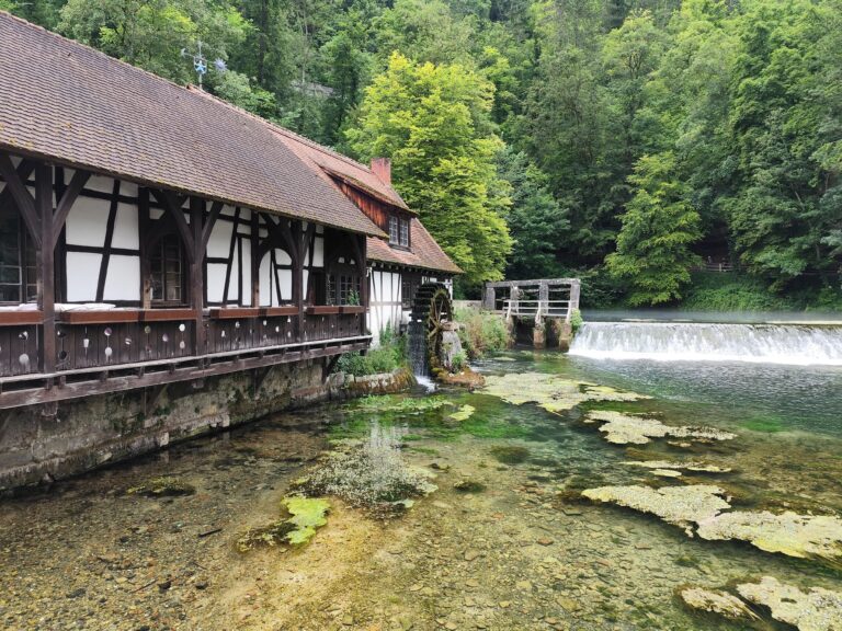 Traditional mill house by the Blautopf Spring near the Danube's source region in Germany
